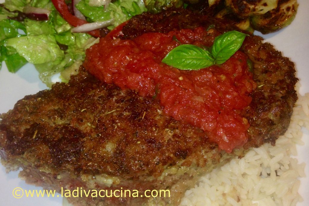 Breaded steak with fresh tomato sauce recipe from Sicily